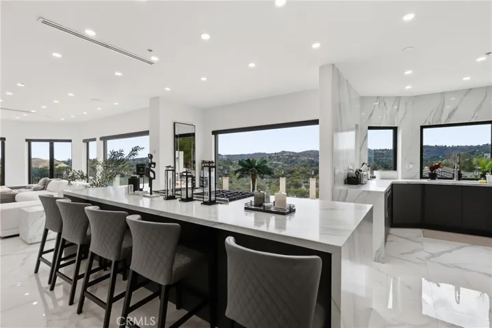 Kitchen with views and large entertainers island.