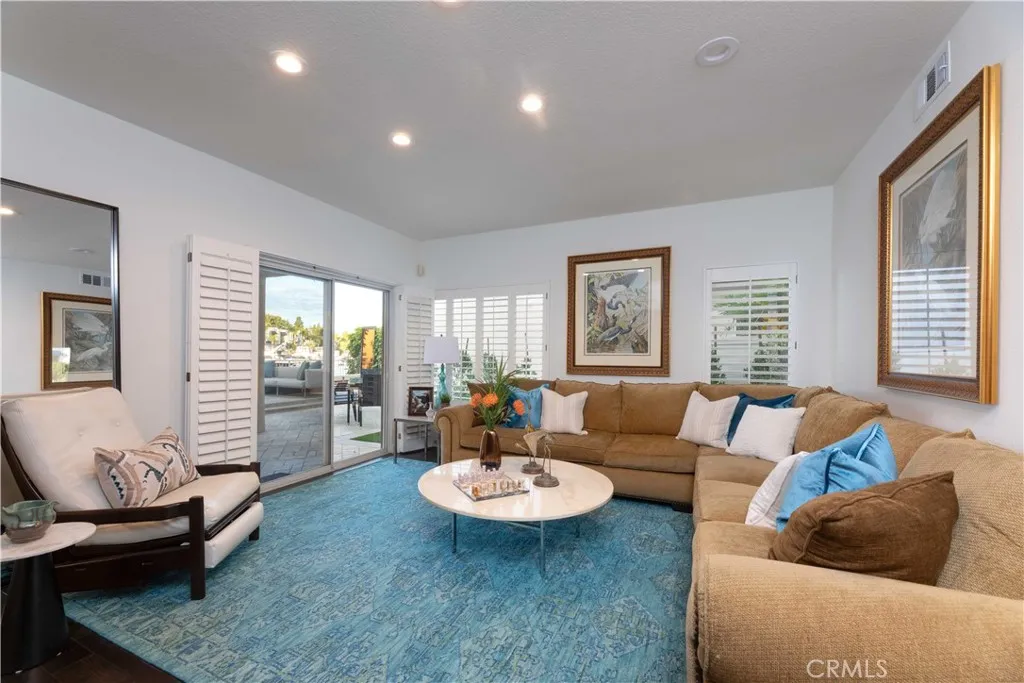 First level living and lounging with direct access to the rear yard and patio