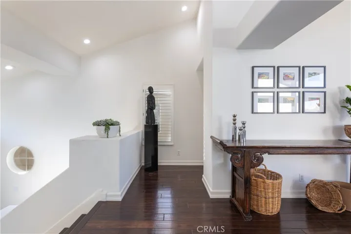 Stairway to the Main Living Level is an Airy and Open