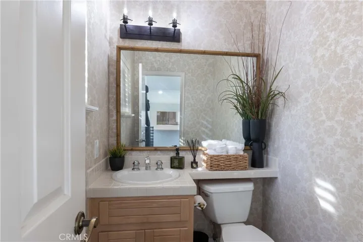 A Convenient Guest 1/2 Bath Adjacent to the Living and Dining Rooms