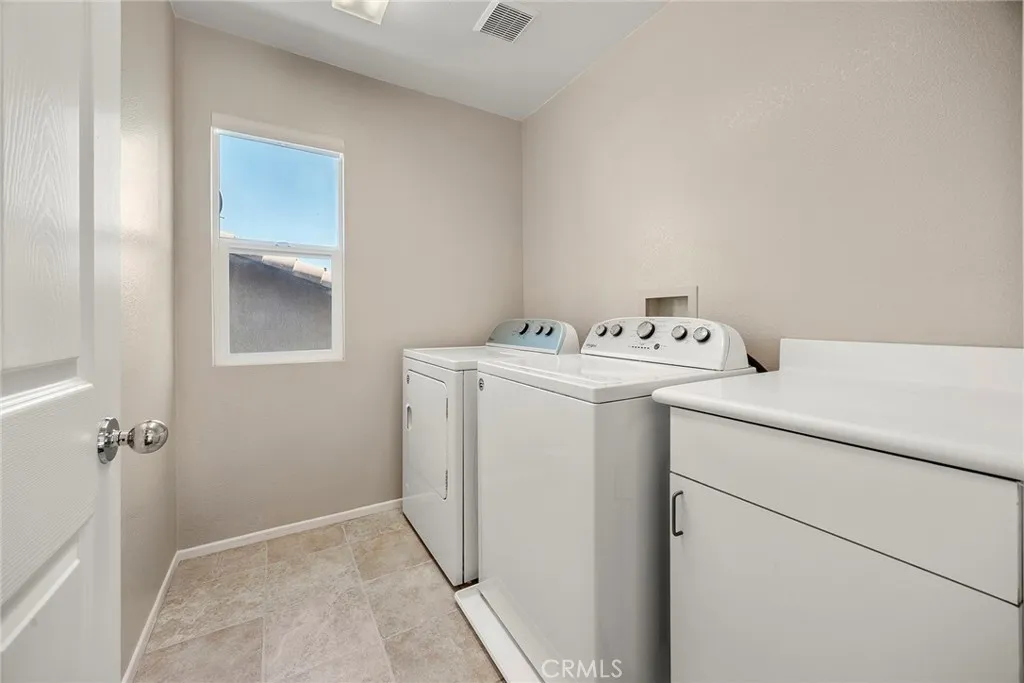 UPSTAIRS LAUNDRY ROOM WITH FOLDING COUNTER UPSTAIRS LAUNDRY ROOM WITH FOLDING COUNTER