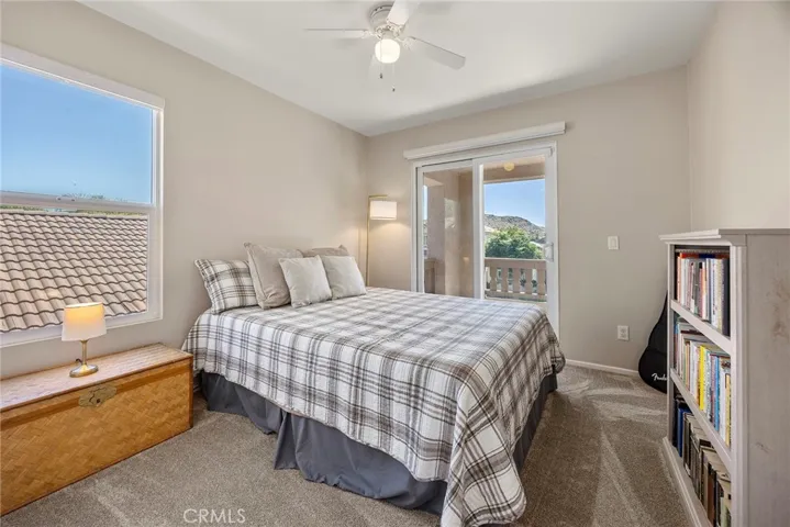 BEDROOM #3 - LOTS OF LIGHT. DOORS LEAD TO THE BALCONY