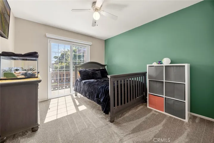 BEDROOM #4 - NEW CARPET, DOORS LEAD OUT TO THE BALCONY