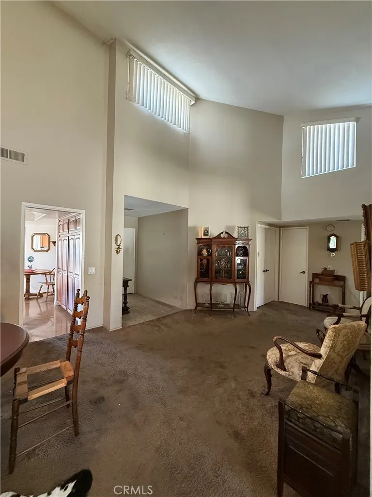 view towards the front door and primary bedroom. view towards the front door and primary bedroom.