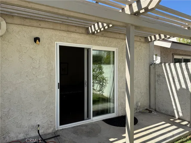 View of second bedroom from backyard