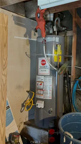 Hot water heater in garage.