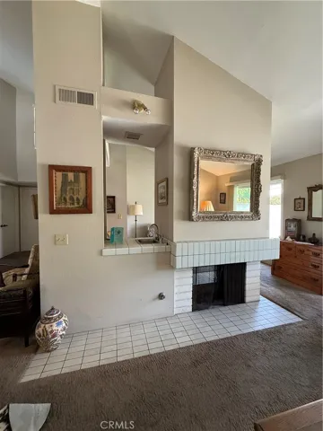Wet bar and dual sided fireplace
