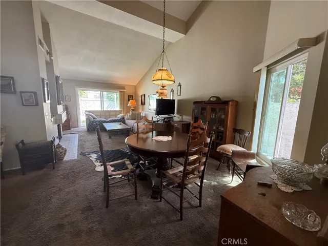 Open floor plan into dining and living area.