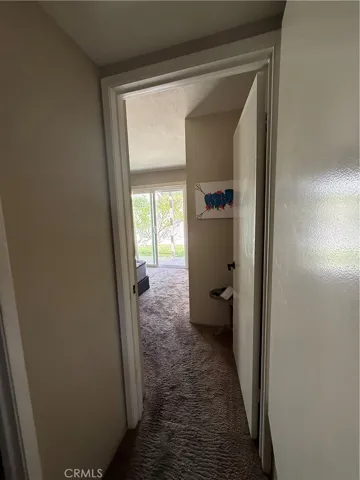 Enter into the second spacious bedroom.