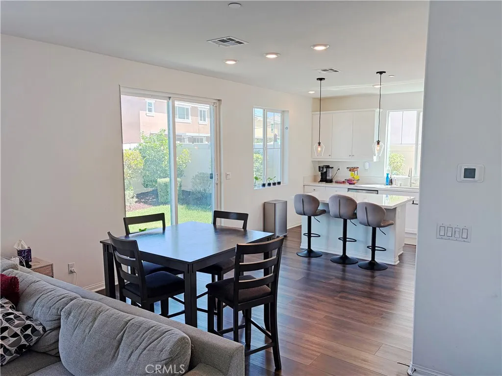 Open concept living room, dining room and kitchen