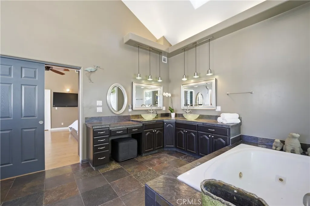Primary Bath Spa Tub/Vanity Area Primary Bath Spa Tub/Vanity Area
