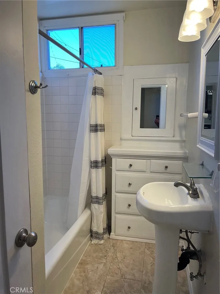 Downstairs Bathroom located in between the two bedrooms