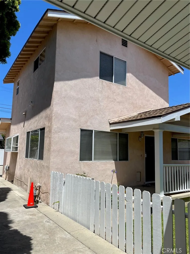 Side view of property (shows side of house andd front porch)