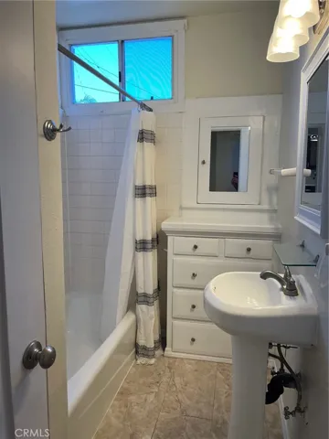 Downstairs Bathroom located in between the two bedrooms