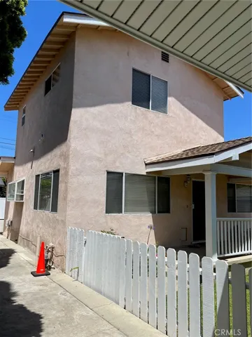 Side view of property (shows side of house andd front porch)