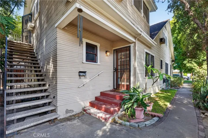 Stairs to upstairs one bedroom unit