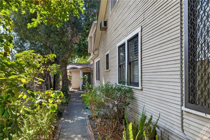 Private side yard walkway to quest house and upstairs unit.
