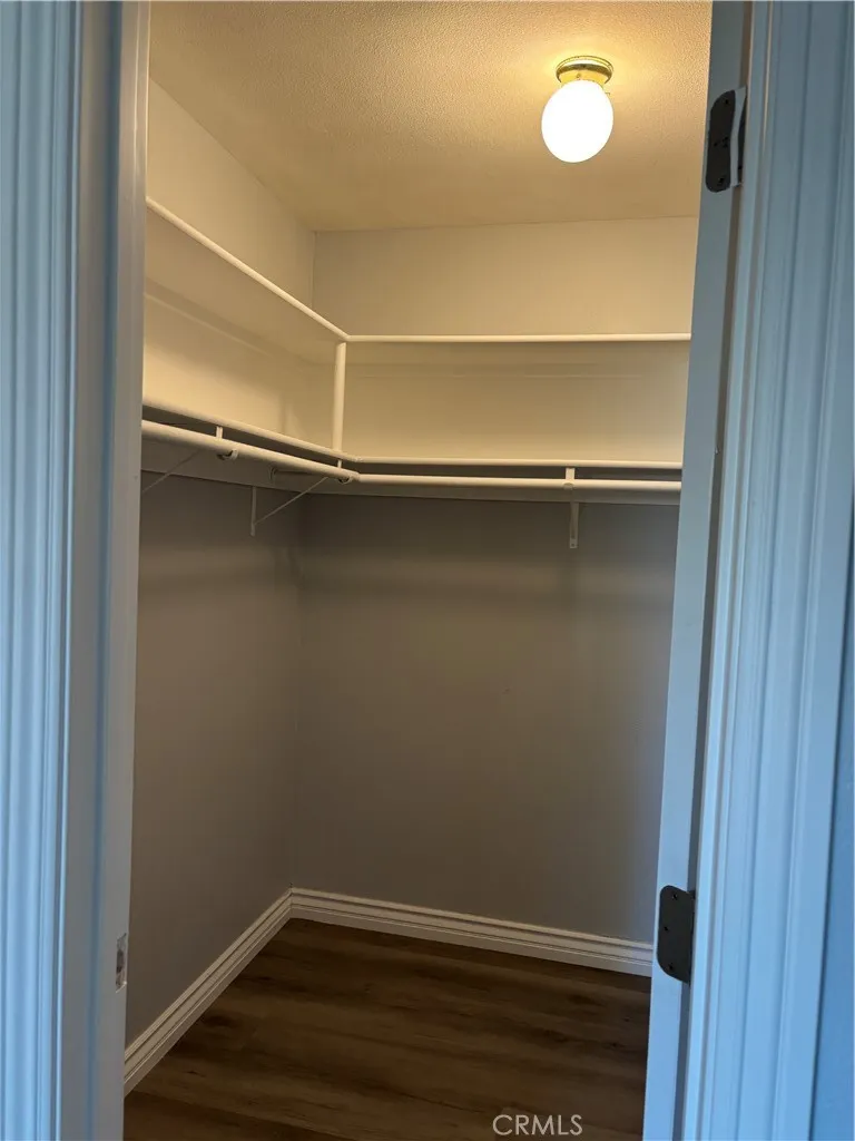 Walk in closet in main bedroom Walk in closet in main bedroom
