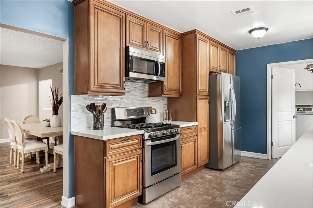 Additional kitchen view highlights abundant storage, functional workspace and easy connection to the surrounding living areas Additional kitchen view highlights abundant storage, functional workspace and easy connection to the surrounding living areas
