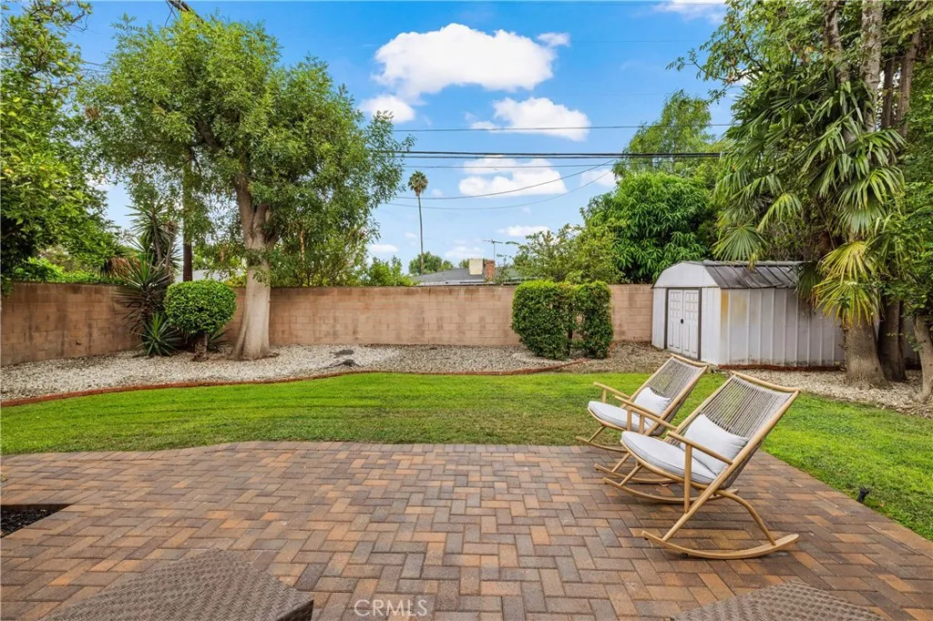 Expansive private backyard features a large brick-paver patio, mature landscaping and plenty of space for outdoor dining and entertaining. Expansive private backyard features a large brick-paver patio, mature landscaping and plenty of space for outdoor dining and entertaining.