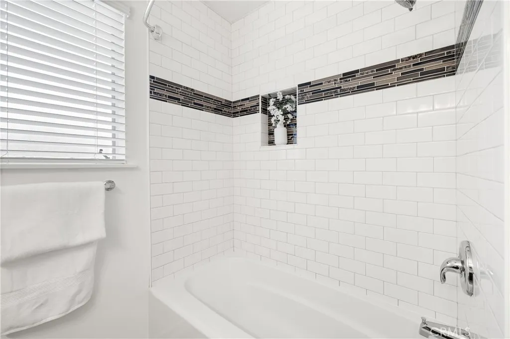 Shower and tub combination provides practical everyday functionality. Shower and tub combination provides practical everyday functionality.