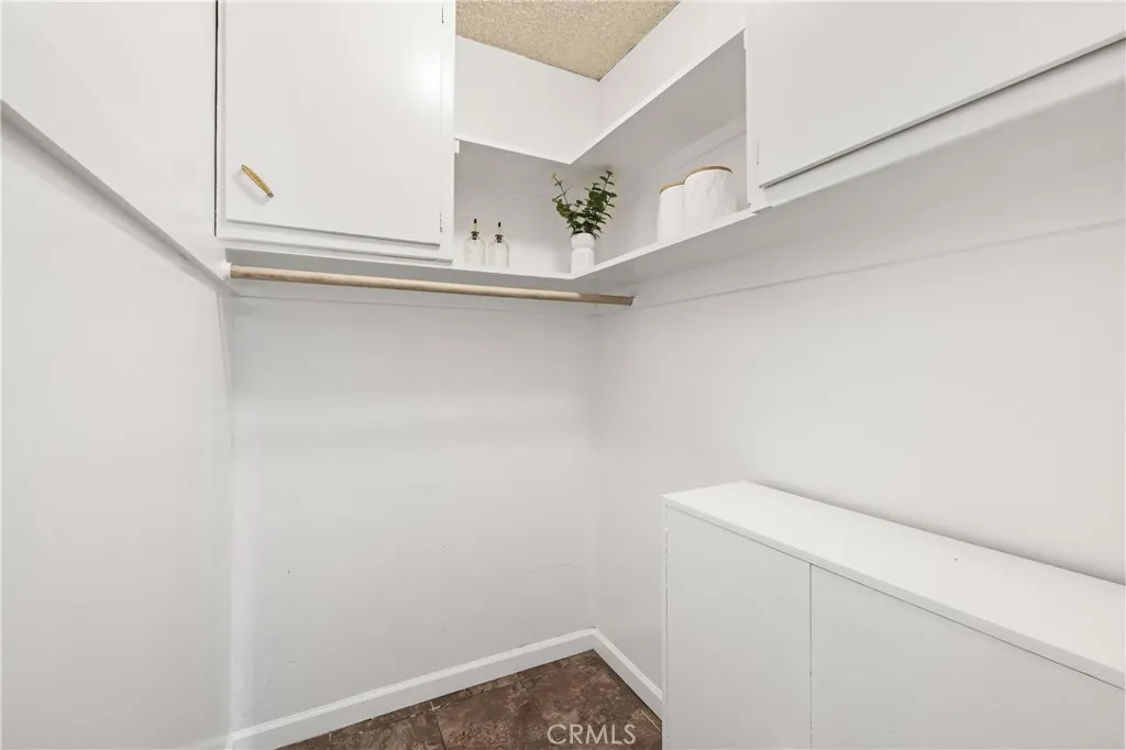 Walk-in pantry/storage area provides valuable additional space for groceries, kitchen essentials and household organization. Walk-in pantry/storage area provides valuable additional space for groceries, kitchen essentials and household organization.