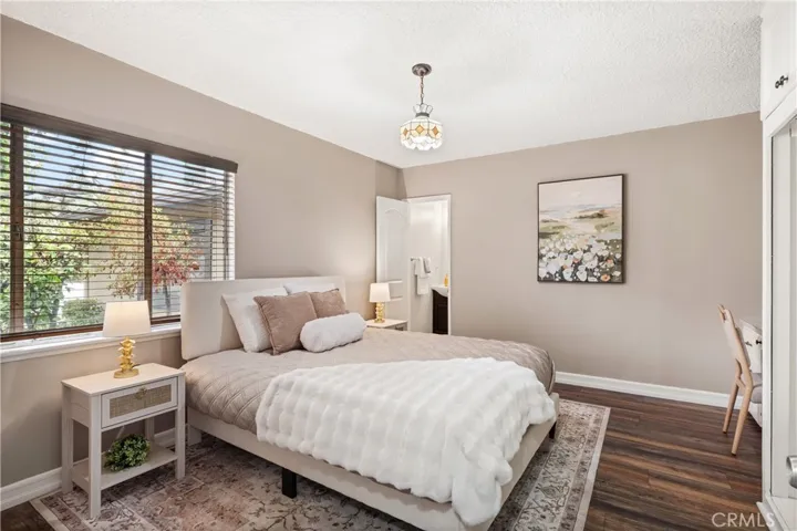 Additional Primary bedroom offers generous proportions, natural light and flexible furniture placement.
