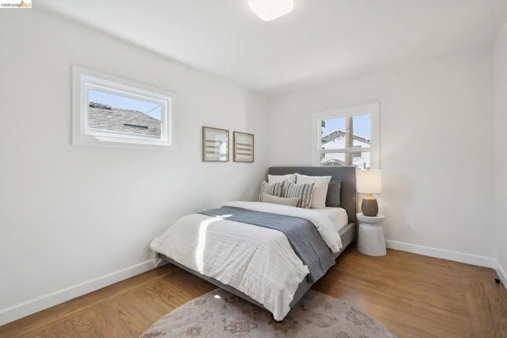 White walls complement wood-finish flooring