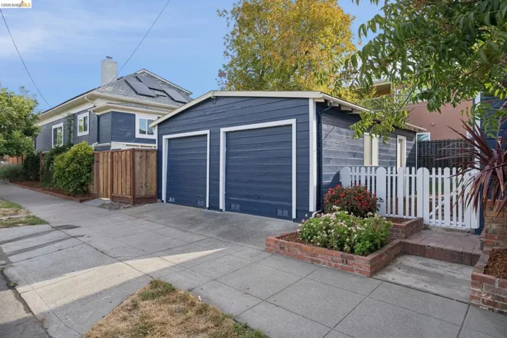 Detached two-car garage with horizontal siding