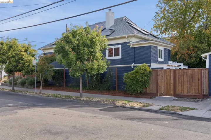 Deep blue exterior siding with white trim