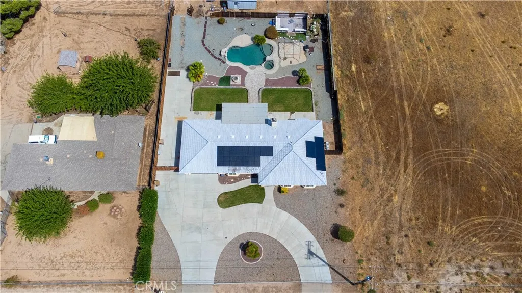 Overhead view of home and pool