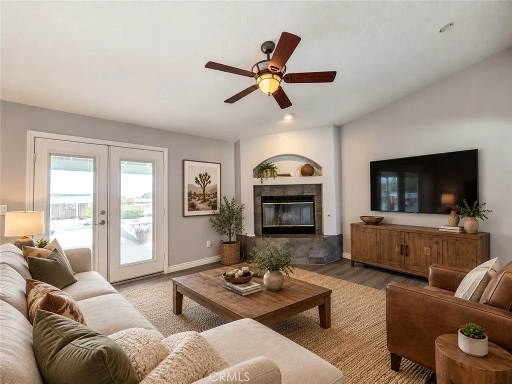 Virtually Staged - family room. Original photo immediately precedes this image.
