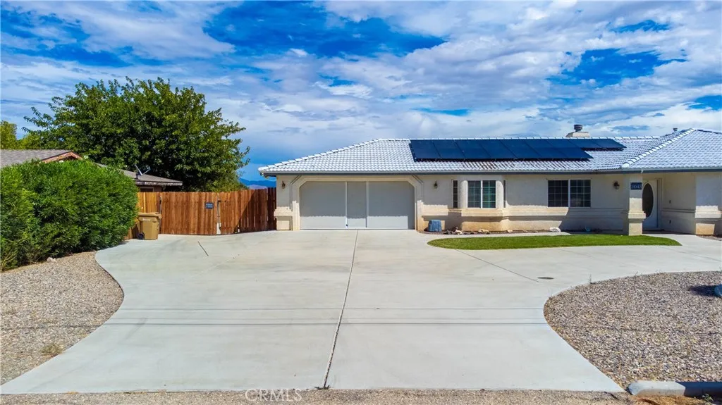 Daytime front exterior and circular driveway