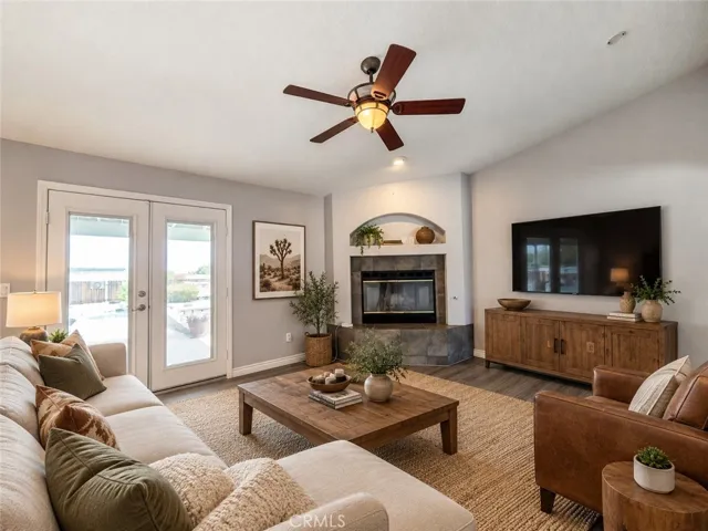 Virtually Staged - family room. Original photo immediately precedes this image.