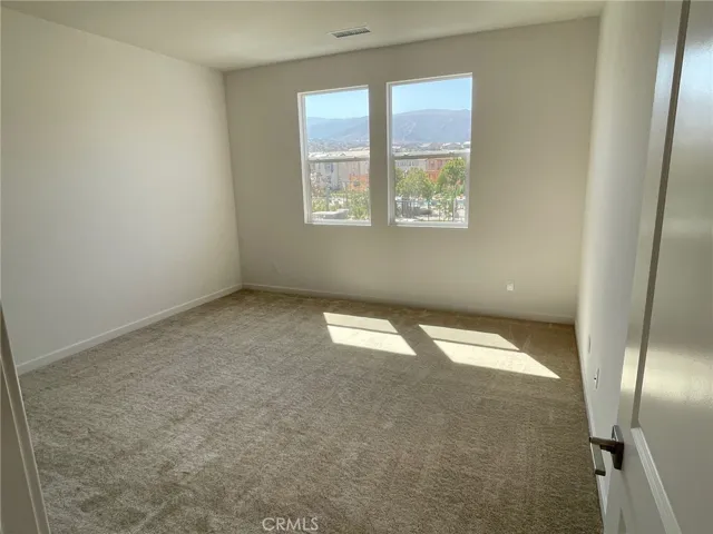Primary Bedroom with view of Mountains
