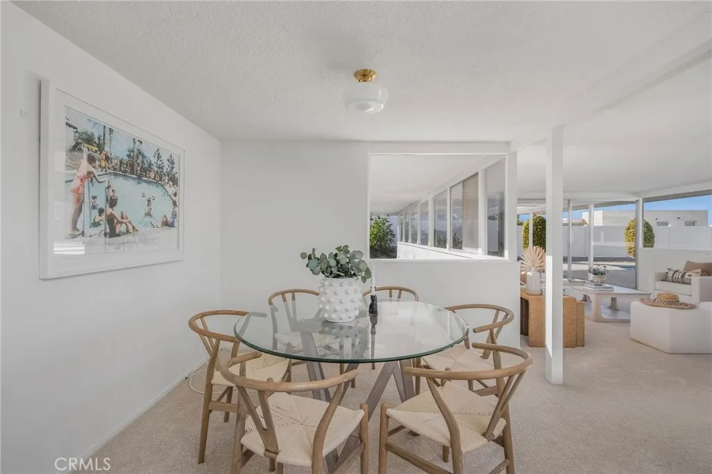 Dining area between kitchen and living room