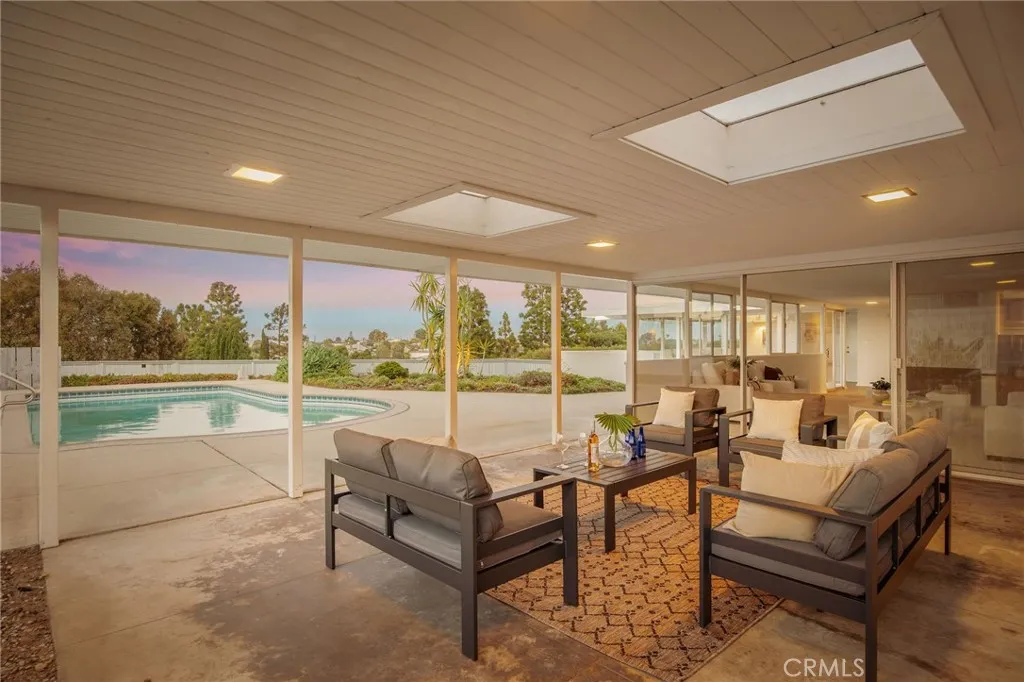 Chill out of the sun in the patio by the pool