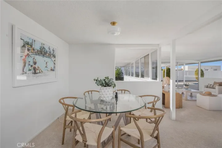 Dining area between kitchen and living room