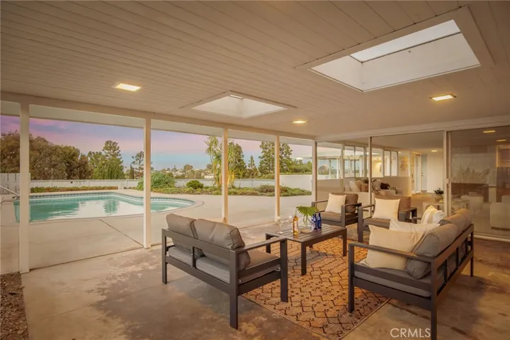 Chill out of the sun in the patio by the pool