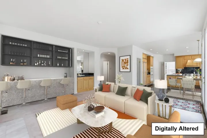 Virtually staged including the white bar area with black top cabinets