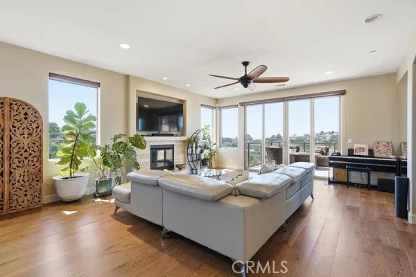 Open-concept living area flowing seamlessly to the balcony with panoramic views.