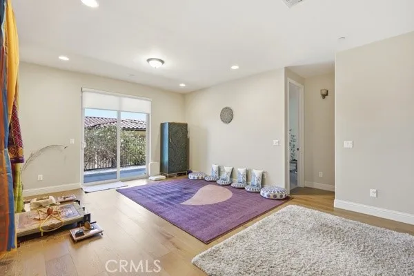 Ground floor family room  with abundant natural light and director access to the out door patio.