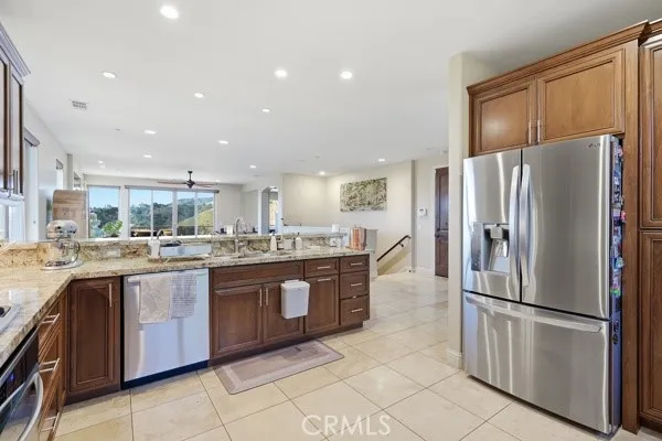 Open-concept kitchen flows seamlessly into the living and dining areas -- ideal for entertaining.
