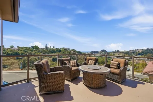 Southwest-facing balcony offering unobstructed views, year-round sunsets, and beautiful rainbow after the rain.