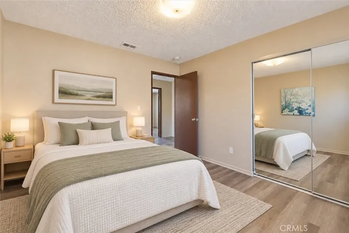 Upstairs Bedroom - Photos have used AI for brightness and staging.