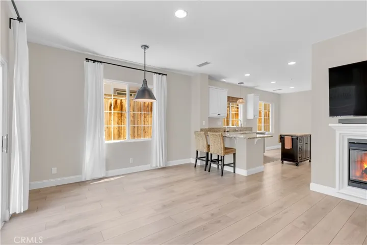 Bright + modern flooring, fixtures, and lighting.