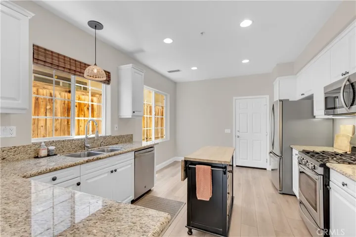 Pottery Barn kitchen island + in kitchen dining area