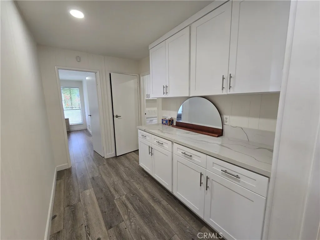 Hallway with storage cabinets