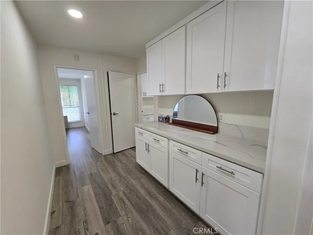 Hallway with storage cabinets