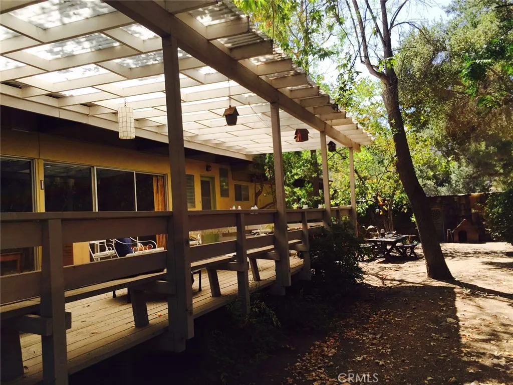 Bright and sunny covered patio makes for great Indoor/Outdoor Living.